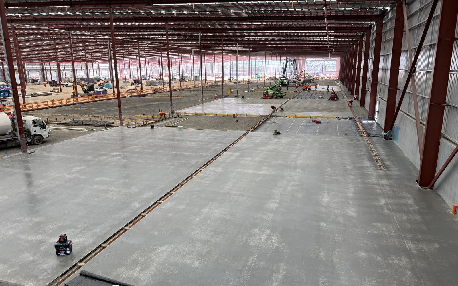 The finished warehouse floor running the length of the Lot F building