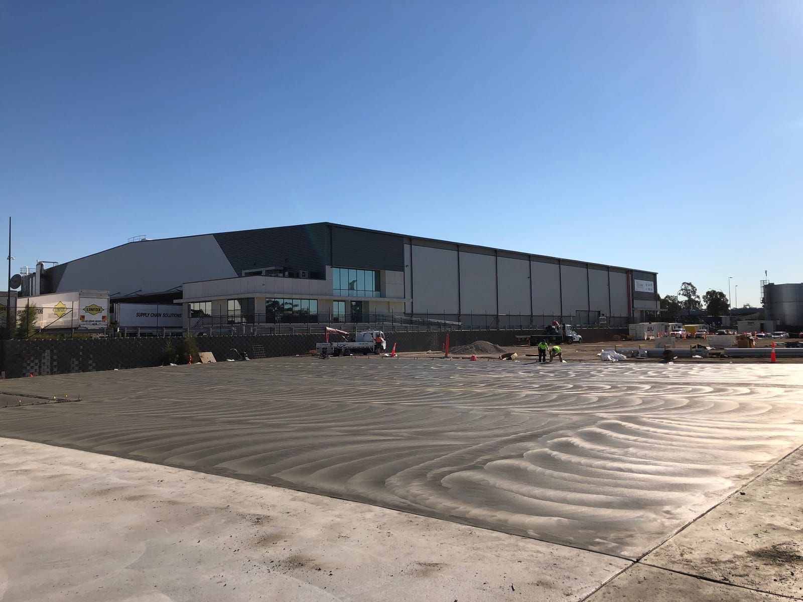 Wide view of a large Lotos Concretors warehouse slab and external hardstand project